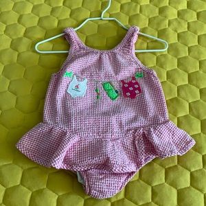 Pink and white bathing suit